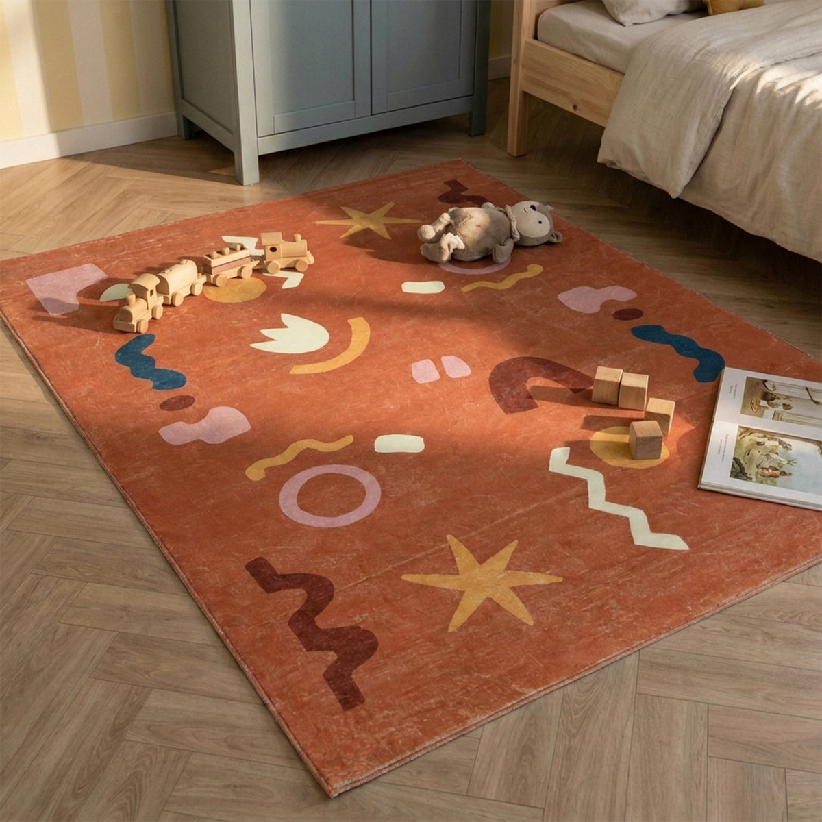 Waschbarer Kinderteppich - Billy Shapes Terrakotta